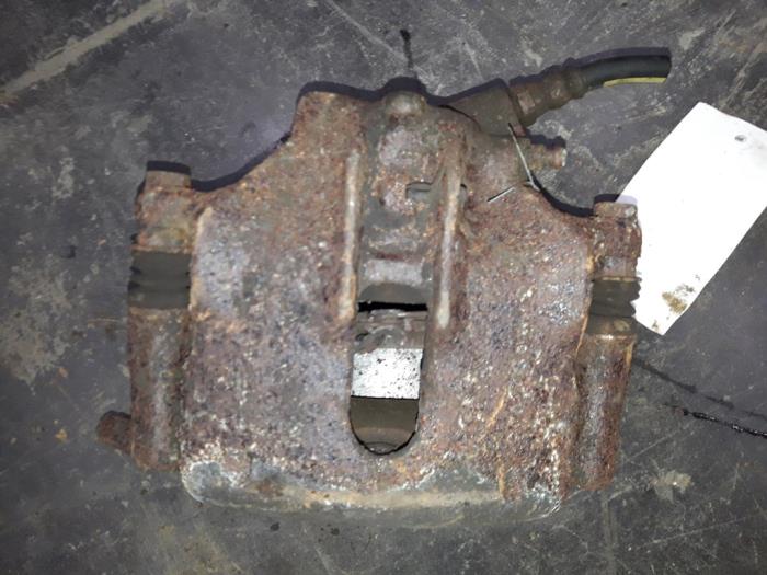 Front brake calliper, left from a Renault Megane Scénic (JA) 2.0 RT 1997