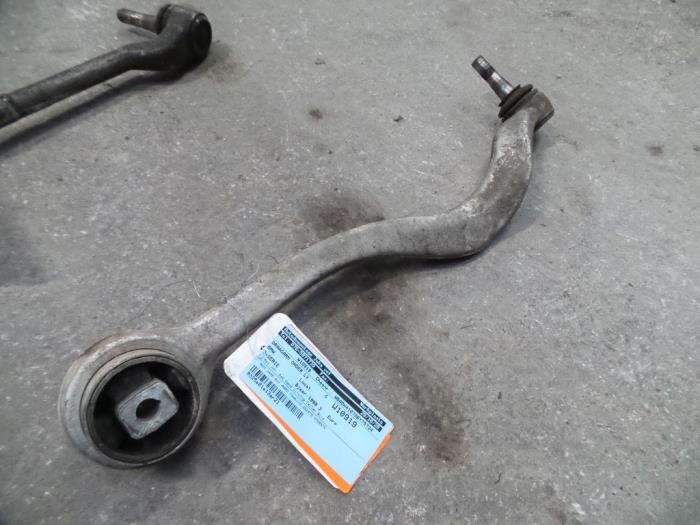 Front lower wishbone, left from a BMW 5 serie Touring (E39) 523i 24V 1998