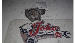 Used Thermostat housing Opel Corsa C (F08/68) 1.2 16V Price on request offered by Autodemontage Joko B.V.