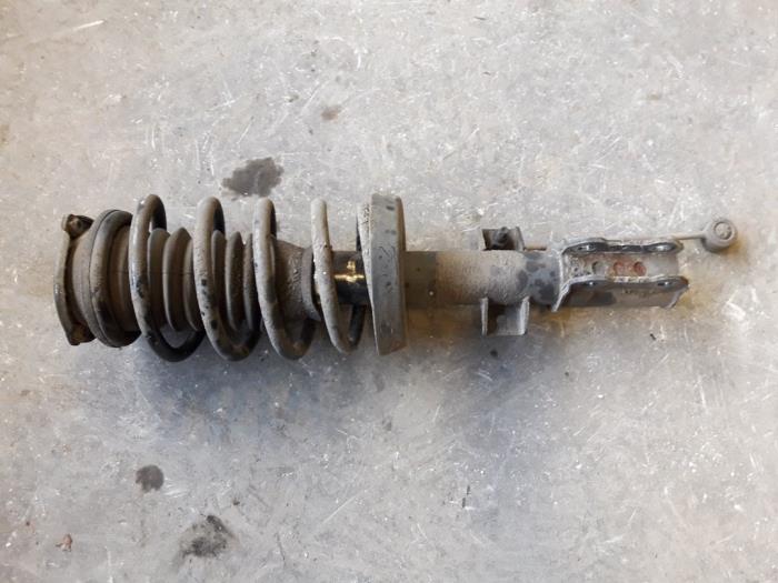 Front shock absorber rod, left from a Saab 9-5 (YS3E) 1.9 TiD 16V 2008