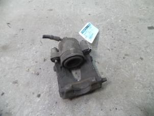 Used Front brake calliper, left Volkswagen Caddy III (2KA,2KH,2CA,2CH) 1.6 TDI 16V Price on request offered by Autodemontage Joko B.V.
