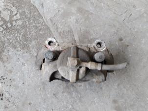 Used Front brake calliper, left Saab 9-3 II (YS3F) 1.8t 16V Price on request offered by Autodemontage Joko B.V.