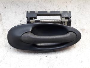 Used Door handle 2-door, right Saab 9-3 II (YS3F) 1.8t 16V Price on request offered by Autodemontage Joko B.V.