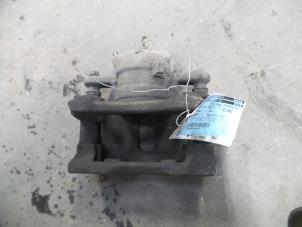 Used Front brake calliper, left Renault Kangoo Express (FW) 1.5 dCi 70 Price on request offered by Autodemontage Joko B.V.