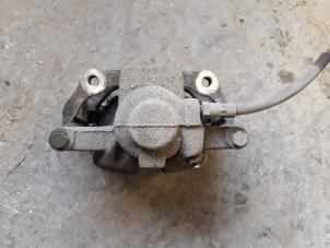 Used Front brake calliper, left Mini Mini Open (R57) 1.6 Cooper D 16V Price on request offered by Autodemontage Joko B.V.