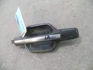 Used Rear door handle 4-door, left Mitsubishi Pajero Hardtop (V6/7) 3.2 DI-D 16V Long Price on request offered by Autodemontage Joko B.V.