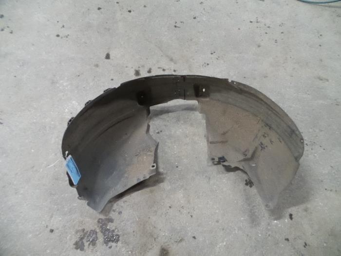 Wheel arch liner from a Opel Corsa D 1.2 16V 2011