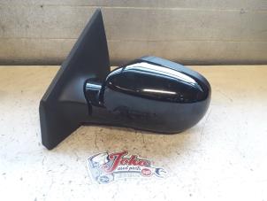 Used Wing mirror, left Renault Clio III (BR/CR) 1.2 16V 75 Price on request offered by Autodemontage Joko B.V.