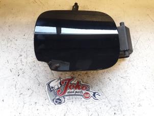 Used Tank cap cover Renault Clio III (BR/CR) 1.2 16V 75 Price on request offered by Autodemontage Joko B.V.