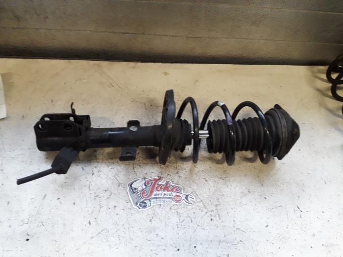Front shock absorber rod, right from a Renault Clio III (BR/CR) 1.2 16V 75 2012