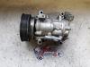 Air conditioning pump from a Renault Clio III (BR/CR) 1.2 16V 75 2012