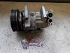 Air conditioning pump from a Renault Clio III (BR/CR) 1.2 16V 75 2012