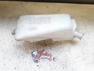 Used Front windscreen washer reservoir Renault Clio III (BR/CR) 1.2 16V 75 Price on request offered by Autodemontage Joko B.V.