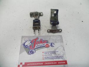 Used Rear door hinge, right Ford Escort 6 Express (AVL) 1.8 D Express 55/75 Price on request offered by Autodemontage Joko B.V.