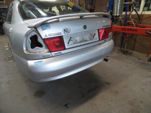 Used Rear bumper Mitsubishi Carisma 1.6i 16V Price on request offered by Autodemontage Joko B.V.