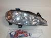 Headlight, right from a Renault Megane 1999