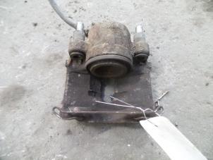 Used Front brake calliper, left Fiat Doblo (223A/119) 1.9 JTD Price on request offered by Autodemontage Joko B.V.