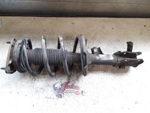 Used Front shock absorber rod, left Kia Rio II (DE) 1.4 16V Price on request offered by Autodemontage Joko B.V.