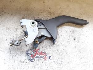 Used Parking brake lever Kia Rio II (DE) 1.4 16V Price on request offered by Autodemontage Joko B.V.