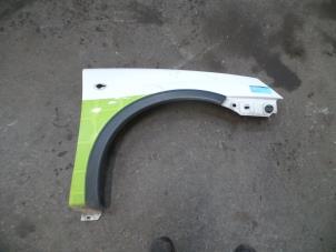 Used Front wing, right Opel Combo (Corsa C) 1.3 CDTI 16V Price on request offered by Autodemontage Joko B.V.