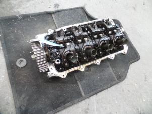 Used Cylinder head Renault Clio II (BB/CB) 1.2 16V Price on request offered by Autodemontage Joko B.V.