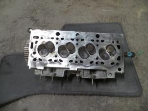 Used Cylinder head Citroen Berlingo Multispace 1.4 Price on request offered by Autodemontage Joko B.V.