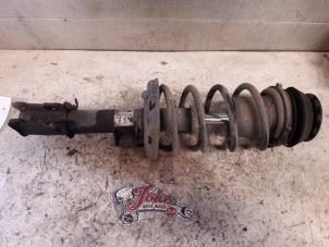 Used Front shock absorber rod, left Opel Tigra Twin Top 1.8 16V Price on request offered by Autodemontage Joko B.V.