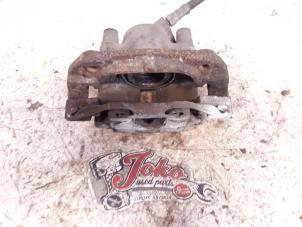 Used Front brake calliper, left BMW 3 serie Touring (E36/3) 316i Price on request offered by Autodemontage Joko B.V.