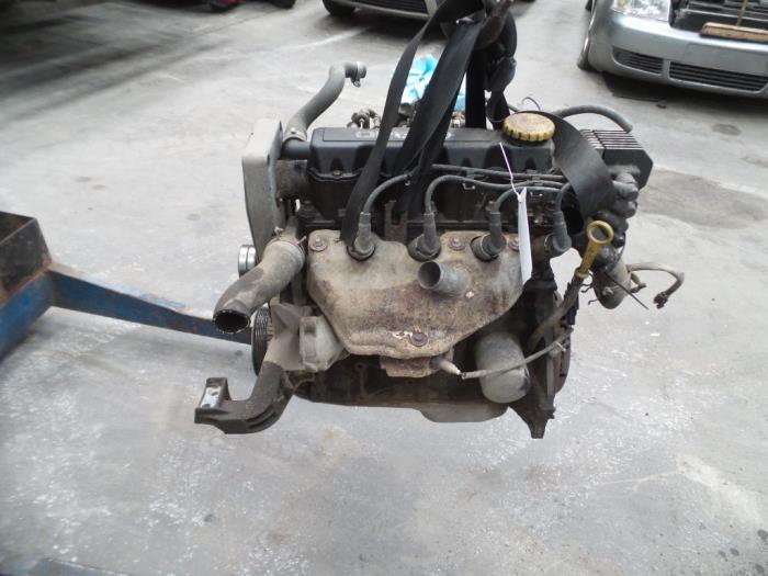 Motor van een Opel Corsa B (73/78/79) 1.4i Swing,Joy,Sport,GLS 1998