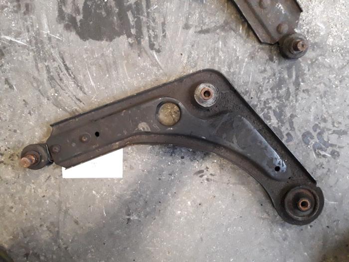 Front lower wishbone, left from a Ford Escort 1996