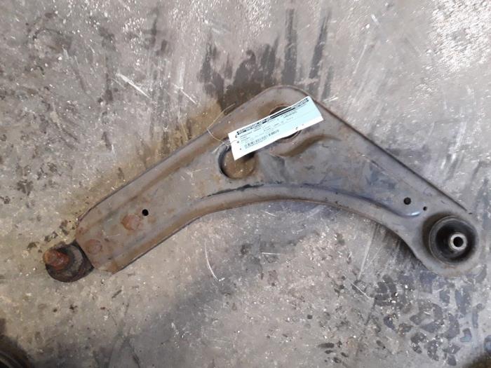 Front lower wishbone, left from a Ford Escort 6 (ANL) 1.6 Laser 16V 1995