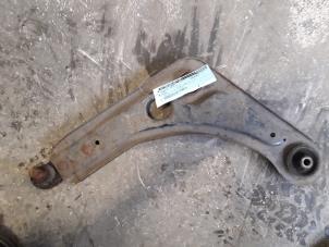 Used Front lower wishbone, left Ford Escort 6 (ANL) 1.6 Laser 16V Price on request offered by Autodemontage Joko B.V.