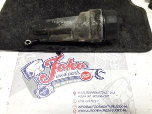 Used Oil filter housing Opel Corsa C (F08/68) 1.0 12V Twin Port Price on request offered by Autodemontage Joko B.V.