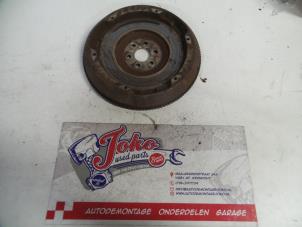 Used Flywheel Opel Corsa C (F08/68) 1.0 12V Twin Port Price on request offered by Autodemontage Joko B.V.