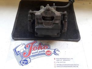 Used Front brake calliper, left Chevrolet Orlando (YYM/YYW) 2.0 D 16V Price on request offered by Autodemontage Joko B.V.