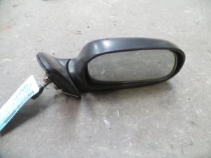 Used Wing mirror, right Toyota Corolla (E10) 1.3 XLi 16V Price on request offered by Autodemontage Joko B.V.