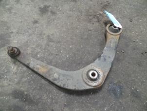 Used Front lower wishbone, right Peugeot 206+ (2L/M) 1.4 HDi Price on request offered by Autodemontage Joko B.V.