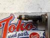 Injector (petrol injection) from a Opel Corsa E, 2014 1.2 16V, Hatchback, Petrol, 1.229cc, 51kW (69pk), FWD, B12XEL, 2014-09 2016
