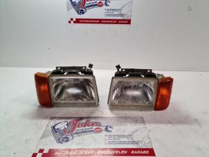 Used Headlight, left Opel Corsa A 1.2 S Price on request offered by Autodemontage Joko B.V.
