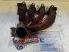 Exhaust manifold from a Renault Clio II (BB/CB), 1998 / 2016 1.4 16V, Hatchback, Petrol, 1.390cc, 72kW (98pk), FWD, K4J710; K4J711; K4J712; K4J713; K4J700, 2000-02 / 2008-07 2001