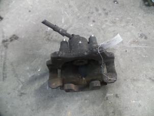 Used Rear brake calliper, left BMW 3 serie Compact (E46/5) 320td 16V Price on request offered by Autodemontage Joko B.V.