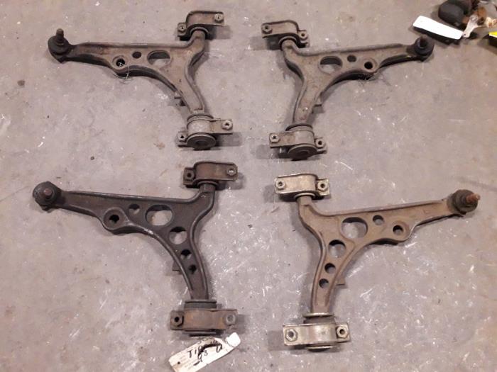 Front lower wishbone, left from a Fiat Tipo (160) 1.4 DGT IE 1990