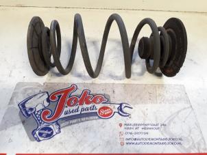 Begagnade Bakre spolfjäder Opel Astra H GTC (L08) 1.4 16V Twinport Pris på förfrågan erbjuds av Autodemontage Joko B.V.