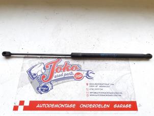 Used Bonnet gas strut, left Opel Astra H GTC (L08) 1.4 16V Twinport Price on request offered by Autodemontage Joko B.V.