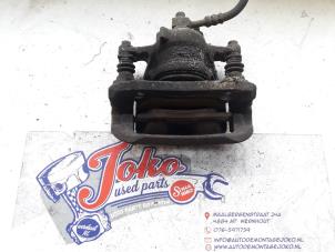 Used Front brake calliper, right Opel Corsa C (F08/68) 1.2 16V Price on request offered by Autodemontage Joko B.V.