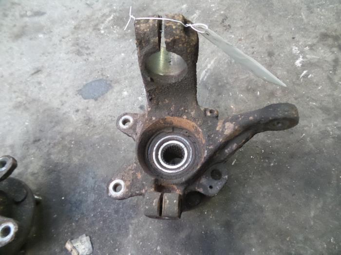 Knuckle, front right from a Ford Fiesta 4 1.25 16V 1998