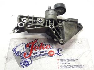 Used Alternator upper bracket Nissan Almera (N16) 1.5 dCi Price on request offered by Autodemontage Joko B.V.