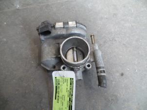 Used Throttle body Opel Corsa C (F08/68) 1.0 12V Twin Port Price on request offered by Autodemontage Joko B.V.