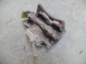 Used Front brake calliper, left Volkswagen Caddy II (9K9A) 1.9 SDI Price on request offered by Autodemontage Joko B.V.