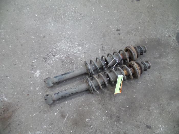 Shock absorber kit from a Volkswagen Polo III (6N2) 1.9 SDI 2001